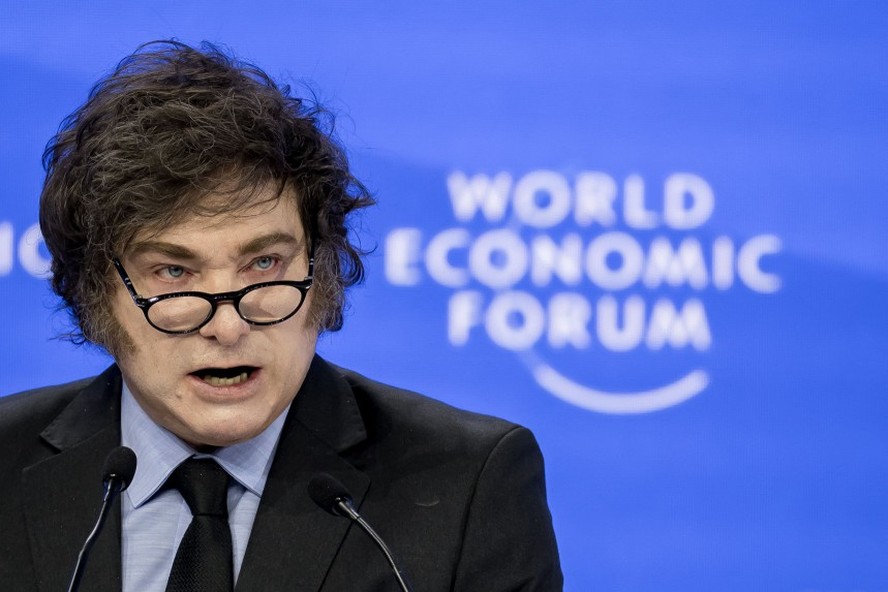 Argentina’s President Javier Milei addresses the audience during the World Economic Forum (WEF) annual meeting in Davos on January 23, 2025. Milei said at a Bloomberg event on January 22, 2026 that 'The world should celebrate the arrival of President Trump,'before Donald Trump will star on January 23, 2025 in an eagerly-anticipated online appearance at the World Economic Forum in Davos, addressing global elites whose annual gabfest has been consumed by the US president's days-old second term